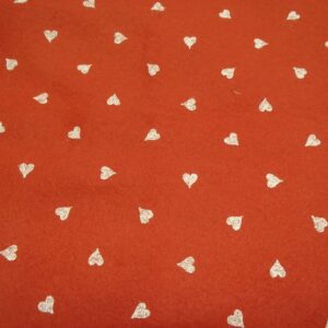 pannolenci arancione con cuori bianchi 45x50 cm